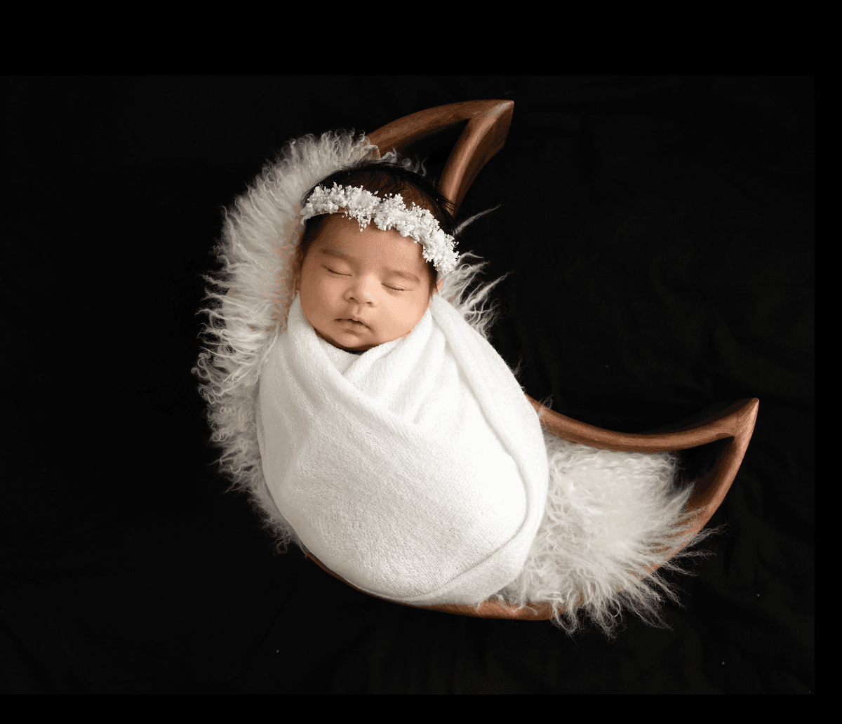 Artistic newborn photograph of a sleeping baby 17